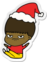 hand drawn sticker cartoon of a boy wearing santa hat png