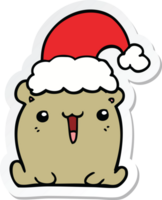 sticker of a cute cartoon bear with christmas hat png