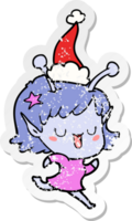 happy alien girl hand drawn distressed sticker cartoon of a wearing santa hat png