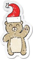 retro distressed sticker of a cartoon teddy bear waving png