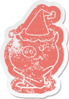 happy quirky cartoon distressed sticker of a pig wearing santa hat png