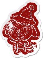 cute quirky cartoon distressed sticker of a dog wearing santa hat png