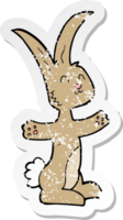 retro distressed sticker of a cartoon rabbit png
