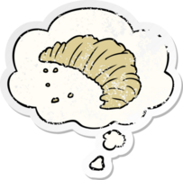 cartoon croissant with thought bubble as a distressed worn sticker png