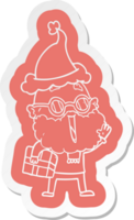 quirky cartoon  sticker of a joyful man with beard and parcel under arm wearing santa hat png