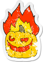 retro distressed sticker of a cartoon flaming halloween pumpkin png