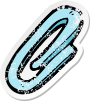 retro distressed sticker of a cartoon paperclip png