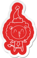 laughing lion quirky cartoon  sticker of a wearing santa hat png