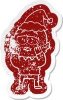 quirky cartoon distressed sticker of a tired bald man wearing santa hat png