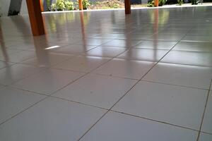 the floor of a building is made of clean white ceramic photo