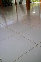 the floor of a building is made of clean white ceramic photo