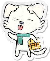 distressed sticker of a cartoon dog with xmas gift png