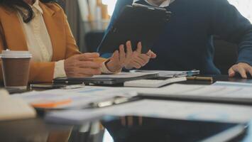 Team of young Asian entrepreneur have serious and disagreement in team meeting for upcoming project for marketing and sale management with skyscraper view for business startup and education concept photo