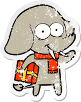 distressed sticker of a happy cartoon elephant with present png