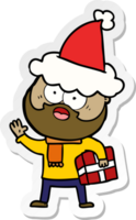 mano disegnato etichetta cartone animato di un' barbuto uomo con presente indossare Santa cappello png
