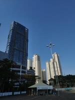 Surabaya, East Java, Indonesia - July 02 2023 - Waterplace Apartment building in PTC Pakuwon Trade Center mall with beautiful cloud sky background photo