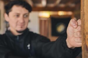 Selective focus on Kung Fu practitioner's fist. photo