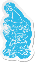 quirky cartoon distressed sticker of a happy boy laughing and running away wearing santa hat png