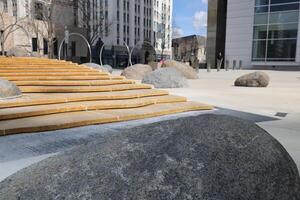 Stone and rock architecture and texture near the steps of the City Hall building in San Jose California photo