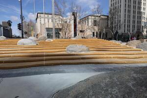 Stone and rock architecture and texture near the steps of the City Hall building in San Jose California photo