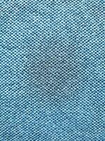textura y antecedentes de azul ropa de deporte tela fútbol americano camiseta foto