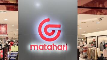 Visitors pass in front of the Matahari Department Store outlet at Metropolitan Mall. Founded in 1958 and is now expanding into the online shop business. Bekasi, Indonesia, May 1, 2024 photo