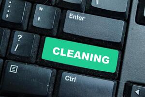 Cleaning write on keyword isolated laptop background photo