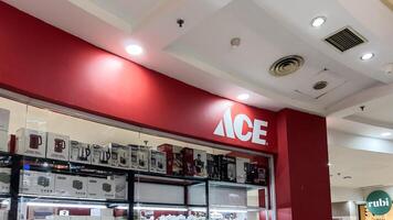 Ace Hardware brand retail shop logo signboard on the storefront in the shopping mall. ACE Hardware known as the world's largest hardware retail cooperative. Bekasi, Indonesia, May 1, 2024 photo