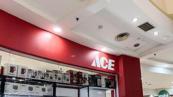 Ace Hardware brand retail shop logo signboard on the storefront in the shopping mall. ACE Hardware known as the world's largest hardware retail cooperative. Bekasi, Indonesia, May 1, 2024 photo