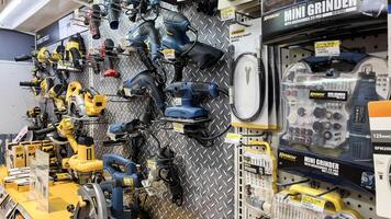 Various choice of hardware tools display in Ace store. Ace Hardware is a hypermarket of home product and building construction in Indonesia. Bekasi, Indonesia, May 1, 2024 photo