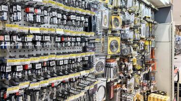 Various choice of hardware tools display in Ace store. Ace Hardware is a hypermarket of home product and building construction in Indonesia. Bekasi, Indonesia, May 1, 2024 photo