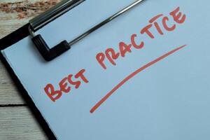 Concept of Best Practice write on paperwork isolated on wooden background. photo