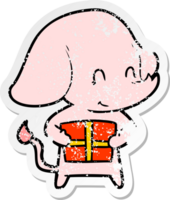 distressed sticker of a cute cartoon elephant with present png