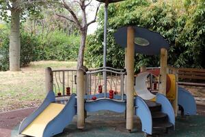 Items for games and sports on the playground in the city park. photo