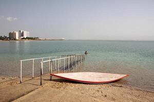 The Dead Sea is a closed, endorheic body of water in the Middle East between Israel and Jordan. photo