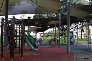 Items for games and sports on the playground in the city park. photo