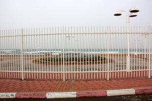 Fence in a city park in Israel. photo