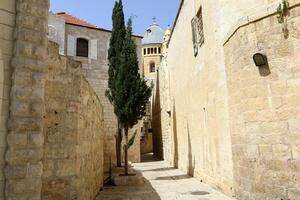 Narrow street in a big city. photo