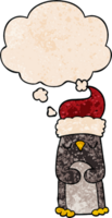 cartoon christmas penguin with thought bubble in grunge texture style png