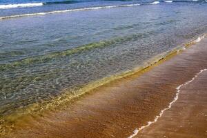 el color de agua en el Mediterráneo mar en superficial agua. natural resumen antecedentes. foto