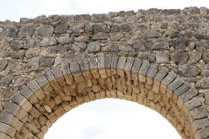 An ancient aqueduct for supplying water to populated areas. photo