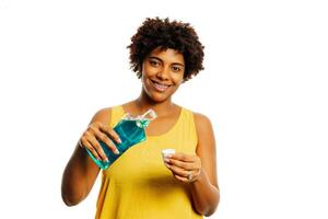 Portrait of black woman wearing braces photo