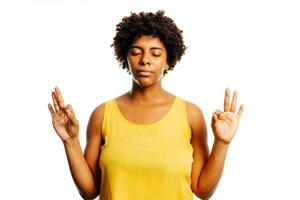 Calm woman relaxing meditating, no stress free relief at work concept, mindful peaceful young businesswoman or student practicing breathing yoga exercises on isolated over lavender background photo