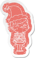 quirky cartoon distressed sticker of a smiling boy with stack of books wearing santa hat png