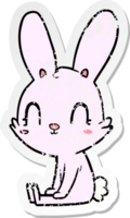 autocollant en détresse d'un joli lapin de dessin animé assis png