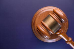 Top view of gavel on dark background with copy space photo