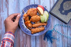 high angle view of Ramadan food in a plate photo