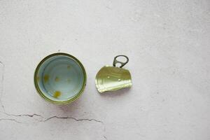 a empty food can on black background , photo