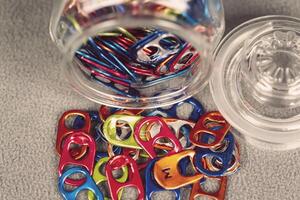 jar full of multi colored can pull tabs photo