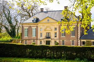 Diepenheim, Netherlands - April 7, 2024. Historic Castle Huis Diepenheim in Province Overijssel in city Diepenheim in Netherlands. High quality photo
